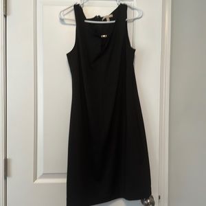 Banana Republic fitted black dress with gold metal detail on neckline